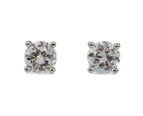 PAIR OF DIAMOND STUD EARRINGS,the round brilliant cut diamonds totalling approximately 1.05 carats, in eighteen carat white g