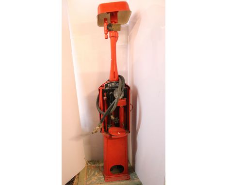 1920s Vintage Bowser petrol pump being red painted with 15 gallon dial and hand crank. Measures 206cm tall. 