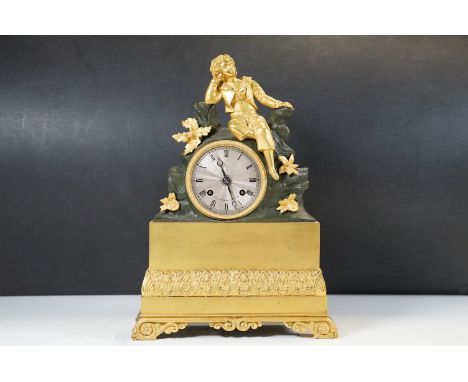 A French Empire bronze and gilt bronze mantel clock, the movement stamped “Willems à Paris”, the dial signed “B.L. Joseph à P