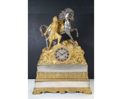 A French Empire ormolu and polished steel mantel clock, the unsigned movement numbered 4029, the case surmounted by an unmoun