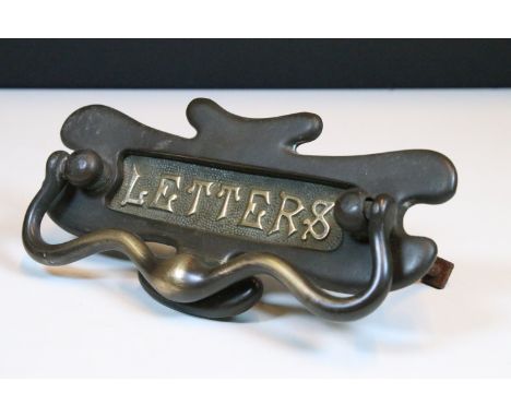 Late 19th / early 20th century Art Nouveau bronze and brass letter box plate with integral knocker, 21cm wide