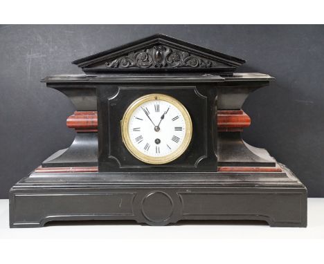 19th Century Victorian slate mantle clock of architectural form with round face to centre having an enamelled dial. Measures 