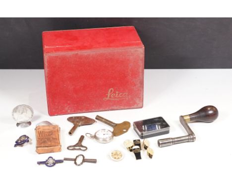 A small box of mixed collectables to include fob watch, clock winder, badges, medal bars, silver coin....etc..