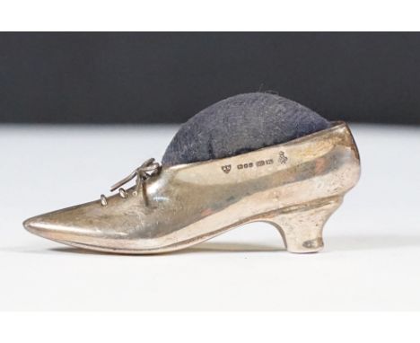 Novelty silver pin cushion in the form of a ladies shoe with blue velvet cushion, London 1990, makers Ari D. Norman&nbsp;