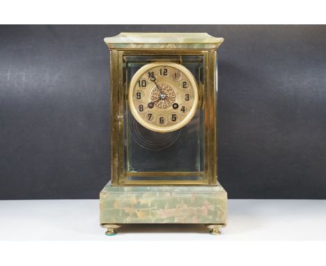 A French green onyx four glass mantel clock, the movement stamped “Marti & Co.”h: 32cm