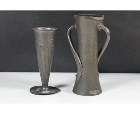 Two Liberty &amp; Co Tudric Pewter Arts &amp; Crafts vases including twisted twin-handled concave trumpet shaped vase, Model 