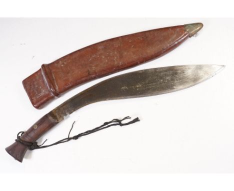 A British military issued post World war One Gurkha Kukri knife, blade marked D &amp; Co, 1920 together with the Broad arrow,
