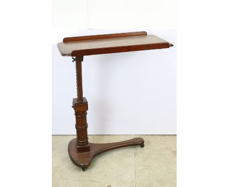 Early 20th Century mahogany and oak mechanical tray / reading table having an adjustable crank action. Carters London label t
