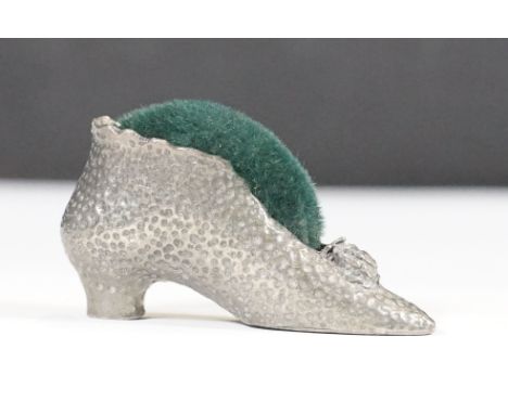 Novelty pewter pin cushion in the form of a ladies shoe with green cushion&nbsp;