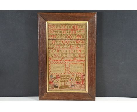 Late 19th century sampler, embroidered with alphabet, numbers, initials and 'Agness Cassels Aged 10' further embroidered belo