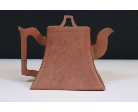 Chinese clay Yixing square base teapot with calligraphy symbol detail to side, H 12cm