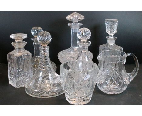 Collection of assorted cut crystal decanters to include a Watford crystal ships decanter together with a smaller engraved exa