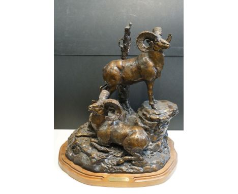 Justin Young (American)“Ridge Top Rams”A monumental bronze group of two bighorn sheep rams on a ledge, limited edition no. 5/