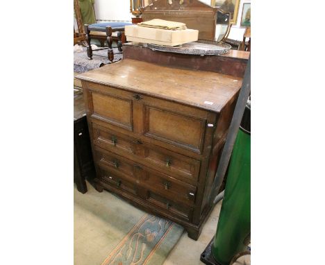 William III oak chest circa 1695, the moulded hinged top enclosing an interior with two panels above three panelled long draw