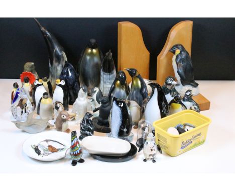 Large mixed collection of penguin figurines to include glass, horn, ceramic, stone, wood and metal examples together with thr