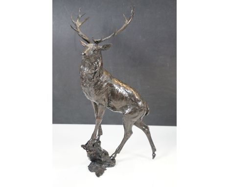 A Jonathan Sanders animalier bronze figure of a stag deer, the base stamped “J.S” and numbered 6/195h: 35cm