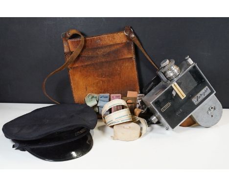 Mid 20th century Setright 1025 bus ticket machine with rolls of ticket, a 'Chossy' vintage leather satchel and bus drivers ca