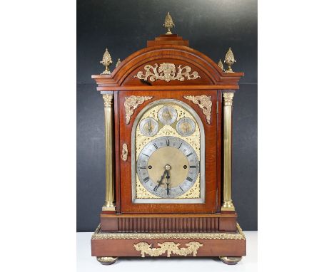 An impressive mahogany and gilt metal mounted mantel clock of large proportions, the three train musical movement striking on