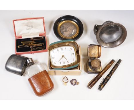A box of mixed collectables to include tie clips, travelling ink well, travel clock, hip flask....etc...