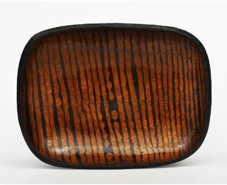 Bernard Leach CBE (1887-1979), attributed a Leach Pottery slip-ware bowl, rounded rectangular form, combed tan and brown glaz