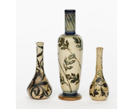 A Martin Brothers stoneware vase by Robert Wallace Martin, shouldered form with cylindrical neck, incised with a band of foli