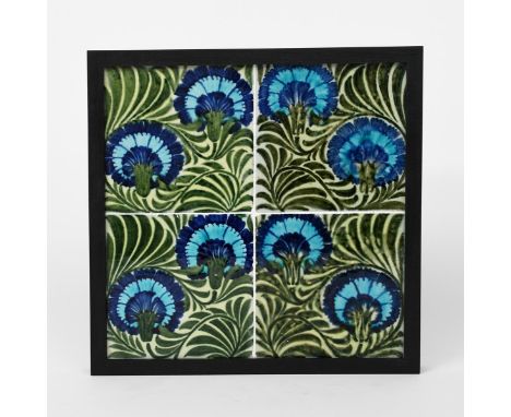 Gillow a William De Morgan four tile panel, each tile painted with two carnation design, in shades of blue, turquoise and  gr