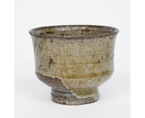 ‡ Ewen Henderson (1934-2000) an early stoneware unomi, the footed bowl of waisted form, covered in a semi-translucent ash gla