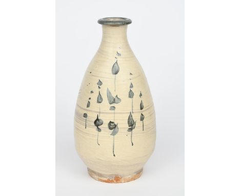 ‡ Jim Malone (born 1946) an Ainstable Pottery stoneware bottle vase, painted with simple bamboo stems in cobalt blue, on hake