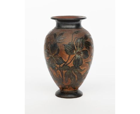 A Martin Brothers stoneware vase by Edwin and Walter Martin, dated 1890, baluster form, incised and painted with clematis flo