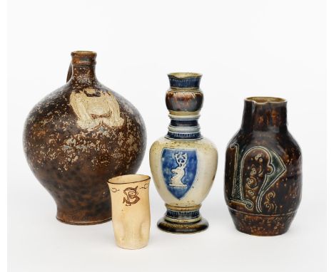 A Martin Brothers stoneware jug by Robert Wallace Martin, dated 1878, slender, shouldered form, decorated with a heraldic shi