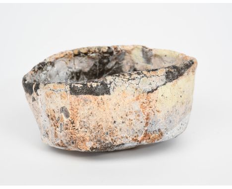 ‡ Ewen Henderson (1934-2000) a stoneware unomi, irregular form with applied slip and glaze unsigned, 15cm. wide, 7.5cm. high 