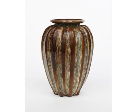 A large Martin Brothers stoneware gourd vase by Edwin and Walter Martin, dated 1900, shouldered, ribbed form with fine incise