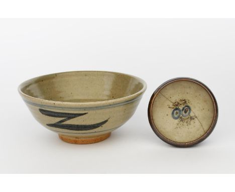 ‡ Bernard Leach CBE (1887-1979) a Leach Pottery shallow bowl, painted to the interior with two flowers in blue and tenmoku on