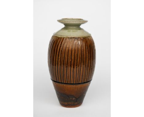 ‡ Richard Batterham (born 1936) a stoneware vase, shouldered form with flaring rim, the body incised with band of vertical cu