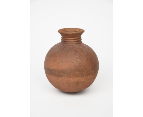 ‡ Magdalene Odundo OBE (born 1950) an early, ovoid earthenware vase with ribbed neck and flaring rim, the body incised with b