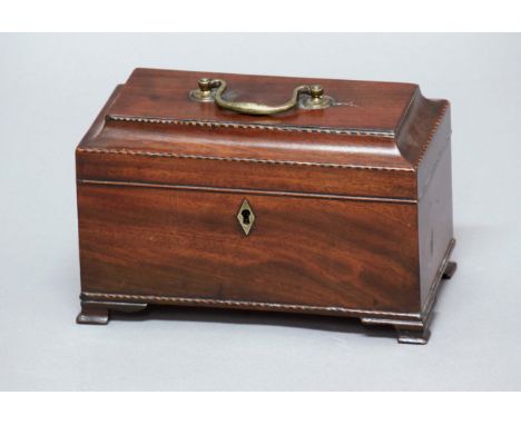 GEORGE III MAHOGANY TEA CADDY, inlaid with string edging, the cover enclosing a three section interior, height 15cm, width 25