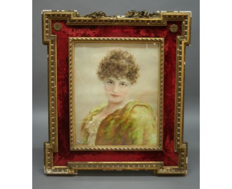 A PICTURE FRAME in the manner of William Kent, with outset corners, egg and dart banding, ribbon twist inner edge and swags, 
