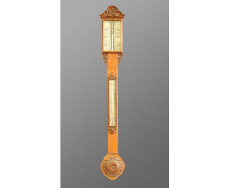 19TH CENTURY STICK BAROMETER, the gauge above a thermometer housed in an oak case with rose carving, height 101cm