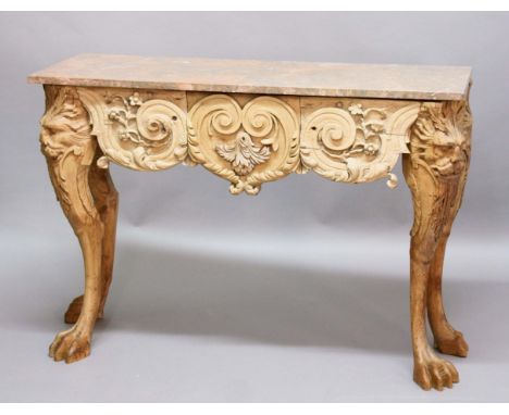 LOUIS XIV STYLE CARVED WOOD AND MARBLE TOPPED CONSOLE TABLE, the bow fronted pale grey and pink marble top above a scrolling 