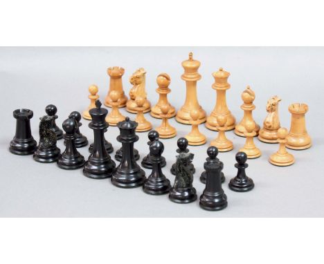 A STAUNTON CHESS SET,
a boxwood and ebony chess set, in a slide top box, height of kings 8.8cm, height of pawns 4cm (complete