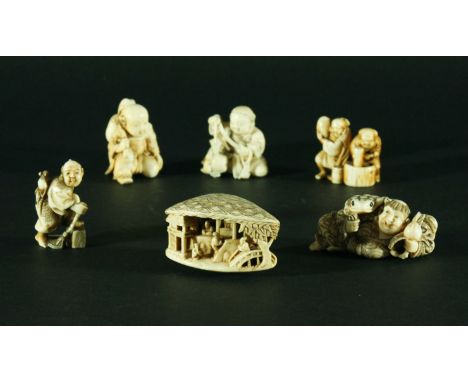 COLLECTION OF SIX NETSUKE, to include a clam shell landscape, a man with a three legged toad and other figures (6)