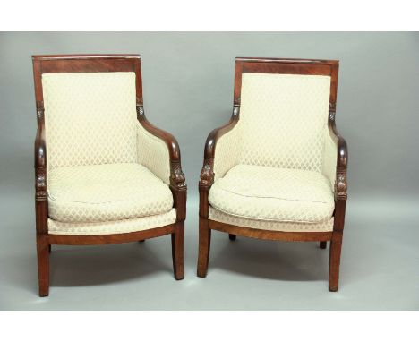 FRENCH EMPIRE STYLE SOFA AND PAIR OF ARM CHAIRS, the padded back above down swept arms with fish head carving, slightly bowed