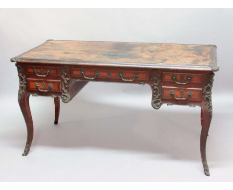 LOUIS XVI STYLE KINGWOOD AND ORMOLU MOUNTED BUREAU PLAT, 19th century, the tooled leather top with brass rim above a single k