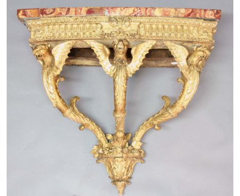 REGENCY GILTWOOD AND GESSO CONSOLE TABLE, the rose and gold coloured bow fronted marble top on a gilt base with griffin monop