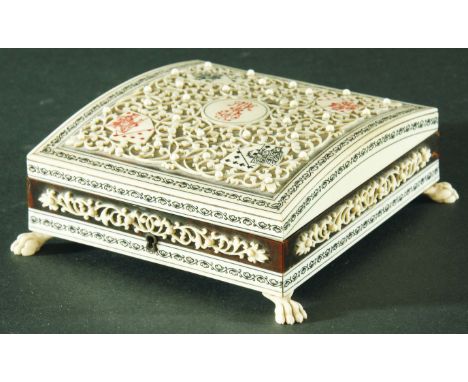 INDIAN SANDELWOOD AND IVORY GAMES BOX, 19th century, Visakhapatnam, the comed cover with scrolling floral decoration around p