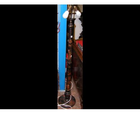 An antique Japanned standard lamp 