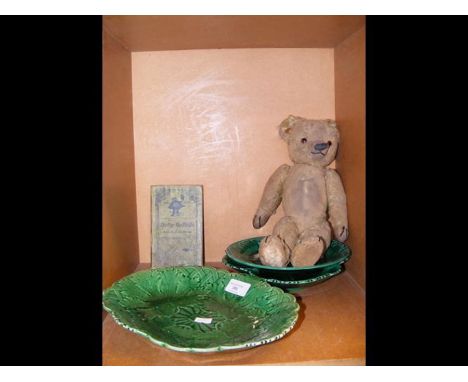 A vintage Chad Valley teddy, three greenleaf plates, together with a volume entitled 'Dolly Ballads'