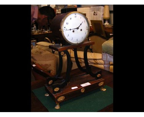 An antique French Empire clock - 40cm high 