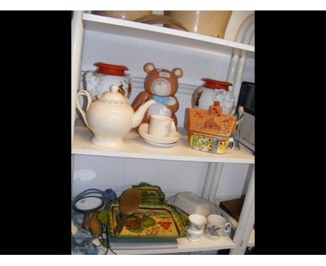 A reproduction Chinese ceramic figure, hand mirror and various ceramics - on two shelves