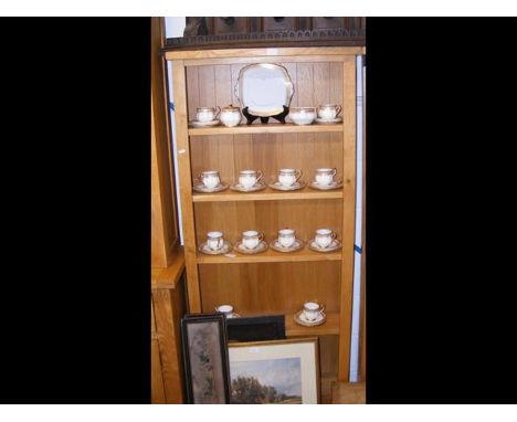 A light oak four shelf open bookcase - width 75cms